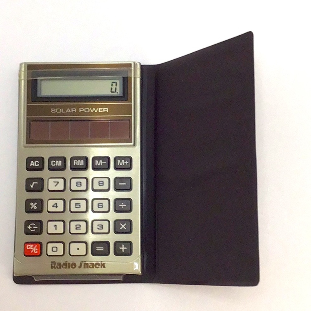 🍄 Vintage Radio Shack Solar Calculator with brown case